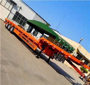 Semiremolc porta maquinària de construcció